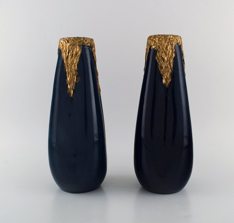 Pierre Perret for Vallauris. A pair of antique vases in glazed ceramics. Beautiful glaze in deep blue shades and hand-painted gold decoration. Early 20th century.