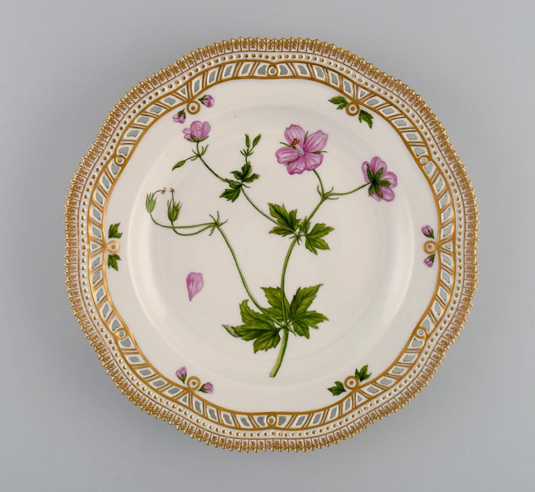 Royal Copenhagen Flora Danica dinner plate in openwork porcelain with hand-painted flowers and gold decoration. Model number 20/3553.