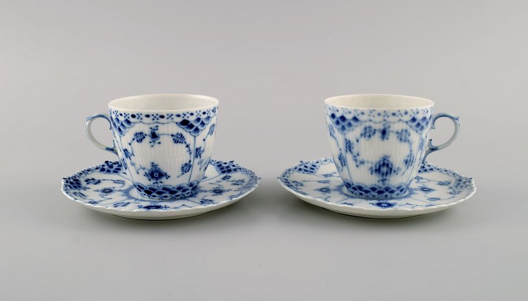 Two Royal Copenhagen Blue Fluted Full Lace coffee cups with saucers. Model number 1/1035.