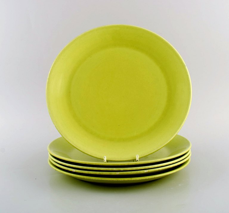 Stig Lindberg for Gustavsberg. Five Spisa-Legum dinner plates in glazed porcelain. 1960s.