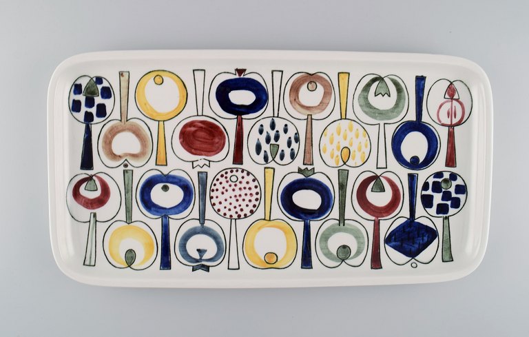 Marianne Westmann for Rörstrand. Large dish in hand-painted stoneware. Colorful Swedish design. 1950s.