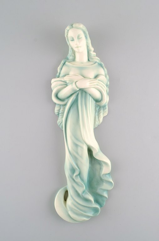 Goldscheider, Austria. Art deco wall figure in glazed ceramics. Madonna. Beautiful glaze in turquoise shades. 1940s.