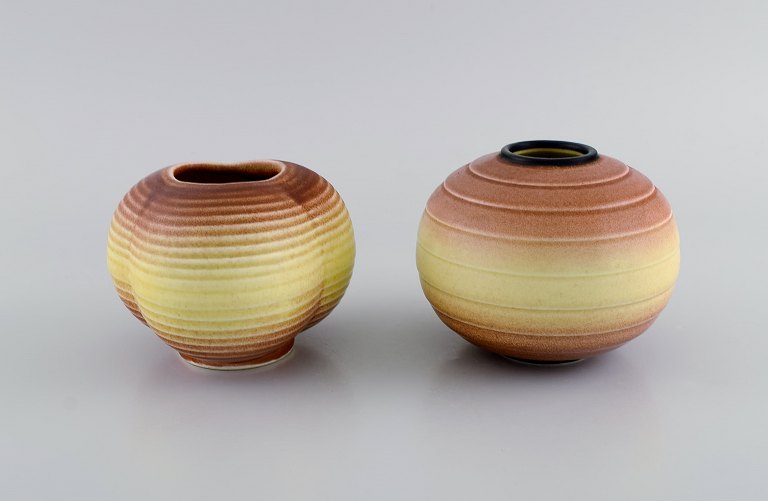 Gertrud Lönegren (1905–1970) for Rörstrand. Two round vases in glazed ceramics. Beautiful peach glaze. 1930s / 40s.