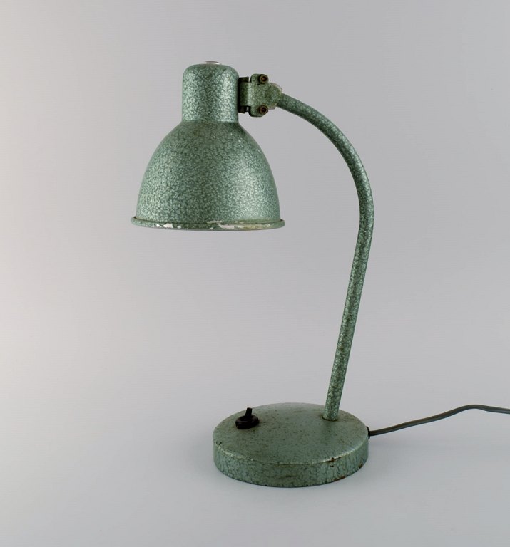 Adjustable desk lamp in original mint green lacquer. Industrial design, mid 20th century.