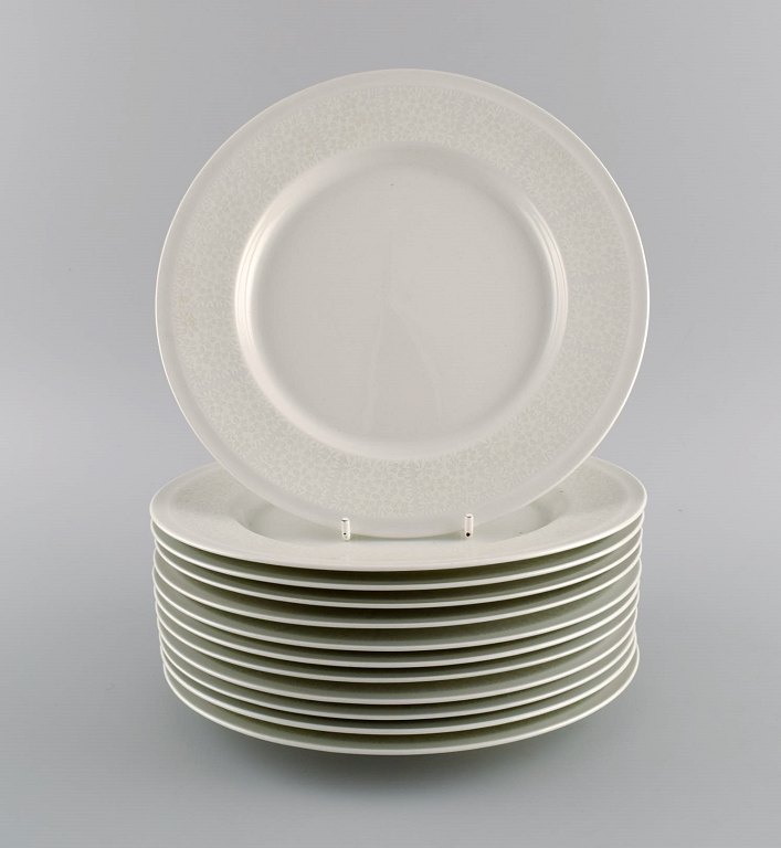 Raija Uosikkinen for Arabia. Twelve rare Pitsi lunch plates with floral decoration. Dated 1967-1974.