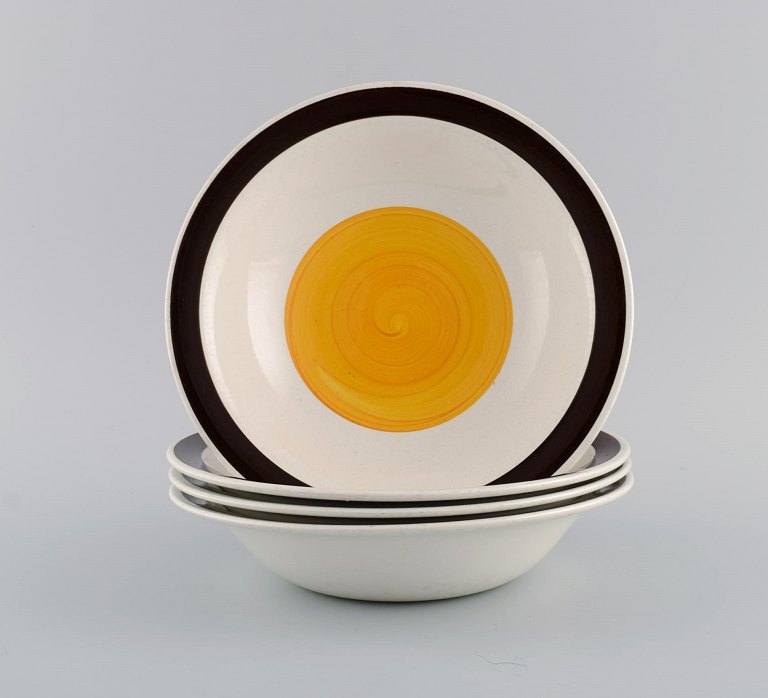 Carl Harry Stålhane (1920-1990) for Rörstrand. Four deep Solöga plates in hand-painted and glazed stoneware. 1960s / 70s.