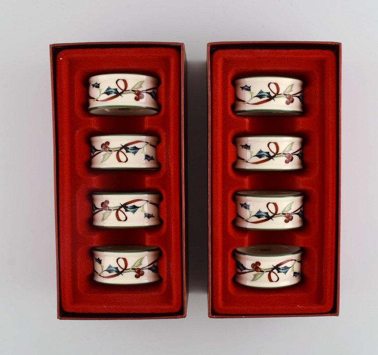 Catherine McClung for Lenox. "Winter greetings everyday". Eight napkin rings in glazed stoneware decorated with mistletoe and red ribbon. Approx. 2000.