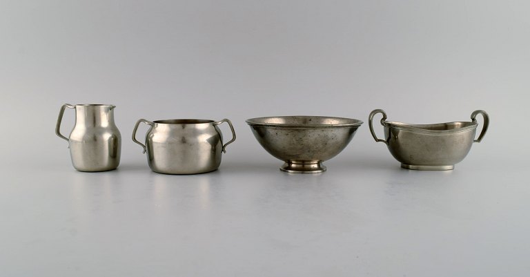 Just Andersen (1884-1943), Denmark. Art deco pewter creamer and three bowls. 1940s.