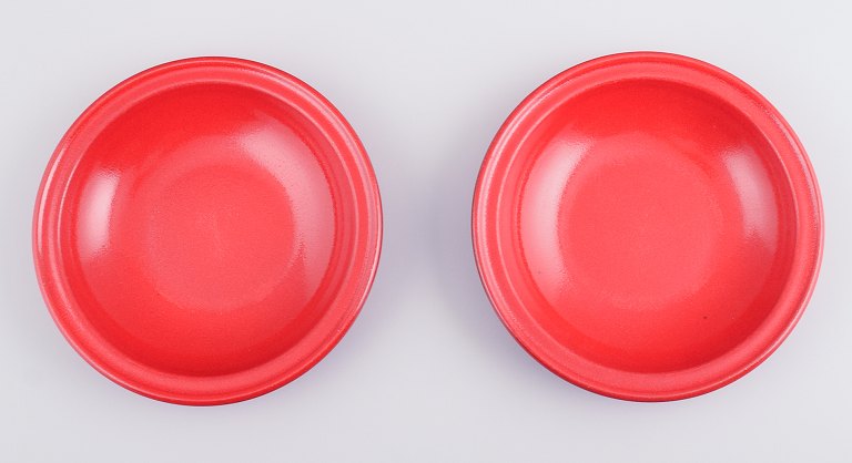 Two French ceramic deep plates with red glaze.Late 1900s.