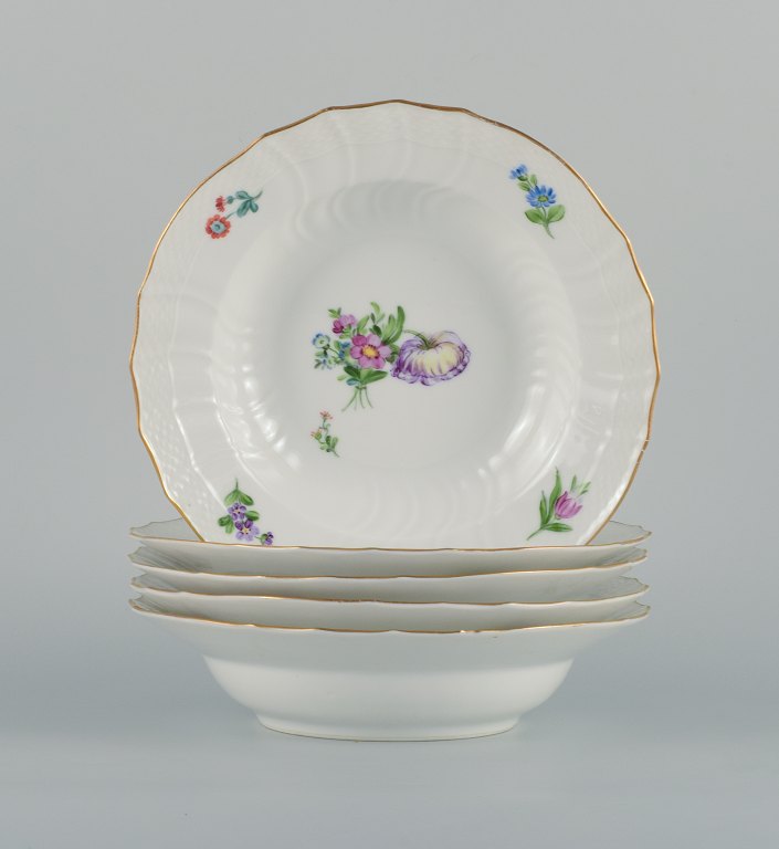 Royal Copenhagen Saxon Flower. Five deep plates in hand-painted porcelain with flowers and gold decoration.