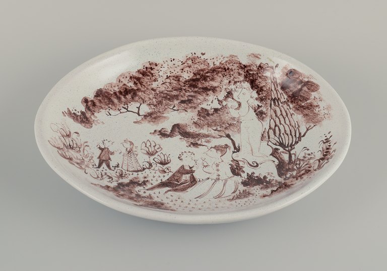 Bjørn Wiinblad, large, early unique hand-painted dish decorated with romantic scenery in a park.
