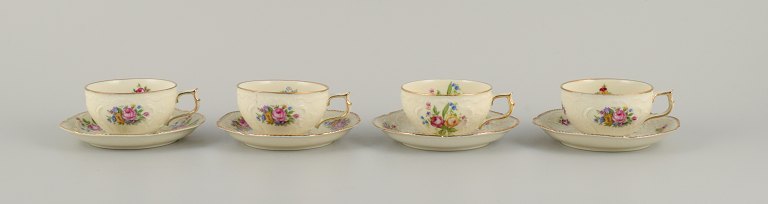 Rosenthal, Germany, "Sanssouci". Four mocha cups with saucers decorated with flowers and gold.
