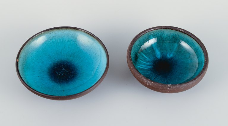 OSA, Denmark.Two small retro unique ceramic bowls with glaze in turquoise tones.