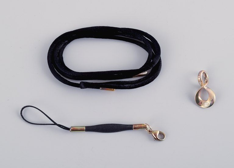 Regitze Overgaard for Georg Jensen. Infinity.Pendant in sterling silver with matching silk cord.