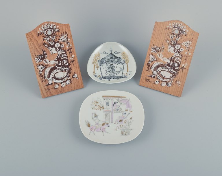 Bjørn Wiinblad (1918-2006), Denmark "Det Blå Hus" (The Blue House). Raymond Peynet and Bela Bachem for Rosenthal.Two small Rosenthal bowls in porcelain and two small wooden serving boards.