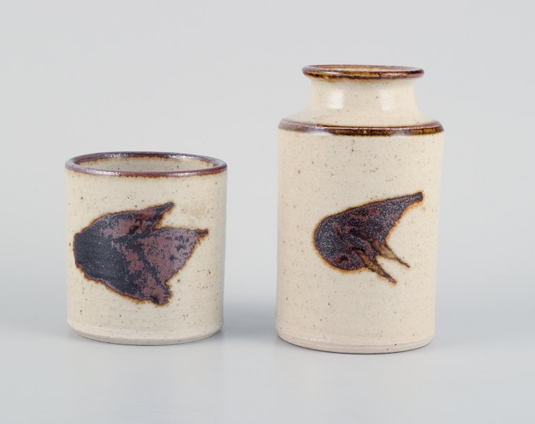 Niels Oluf Thorkelin Eriksen, Danish ceramicist, two unique vases with abstract motifs in sandy and brown shades.