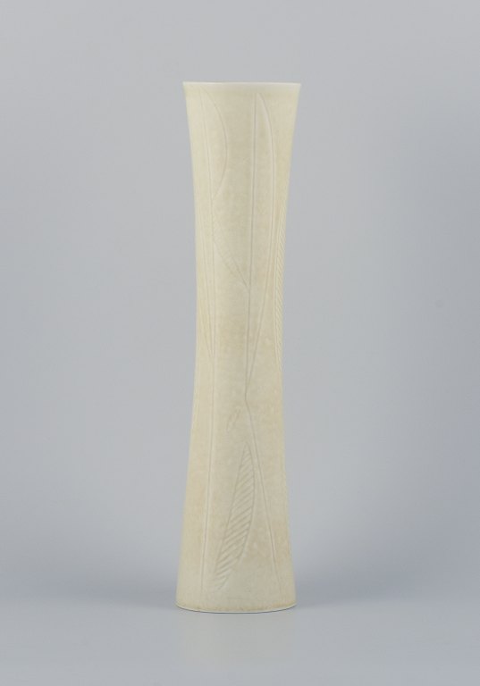 Carl Harry Stålhane for Rörstrand, tall and slender ceramic vase decorated with geometric pattern and cream-colored glaze.