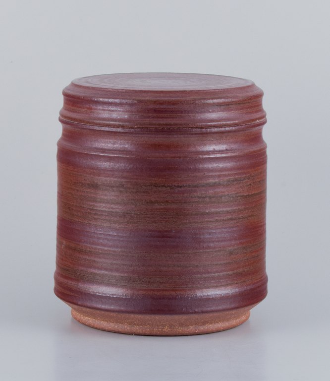 Mogens Nielsen, Nysted, Denmark,colossal handmade ceramic lidded jar with brown glaze.