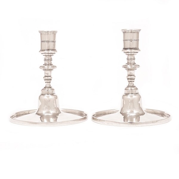 Pair of early Baroque silver candlesticks by Asmus Fridrich Holling, Copenhagen, 1727-73, dated 1728. H: 12cm. W: 458gr