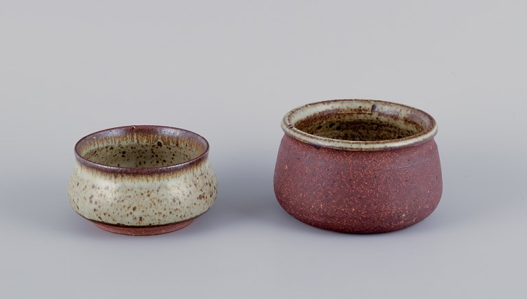 Stouby Keramik, Denmark.Two pieces of handmade ceramic in light and brown shades.