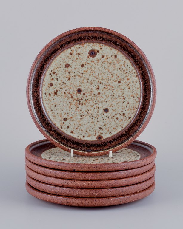 Nysted Ceramics, DenmarkSix handmade ceramic plates in brown shades.