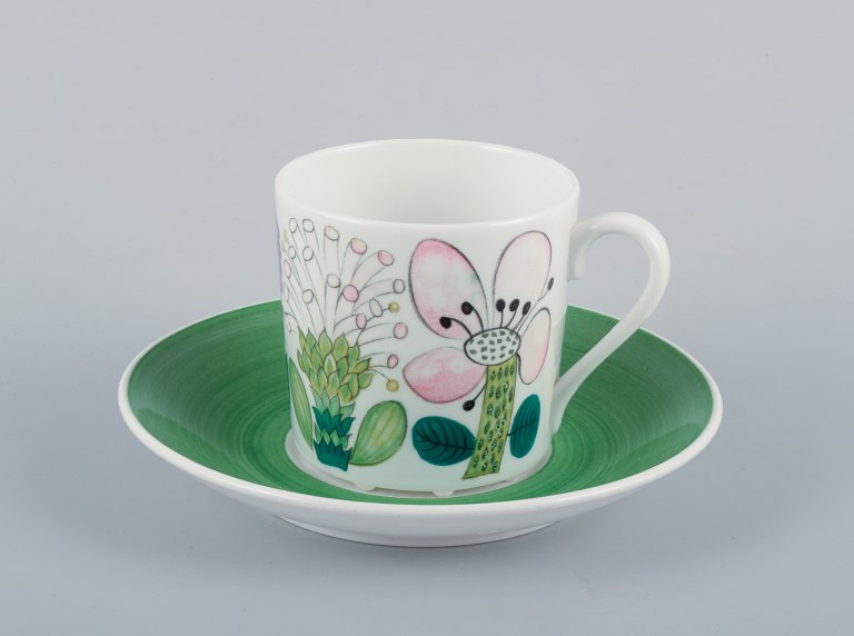 Stig Lindberg for Gustavsberg, Sweden. Rare "Tahiti" coffee cup with  saucer. Hand-painted with floral motifs. Retro style.