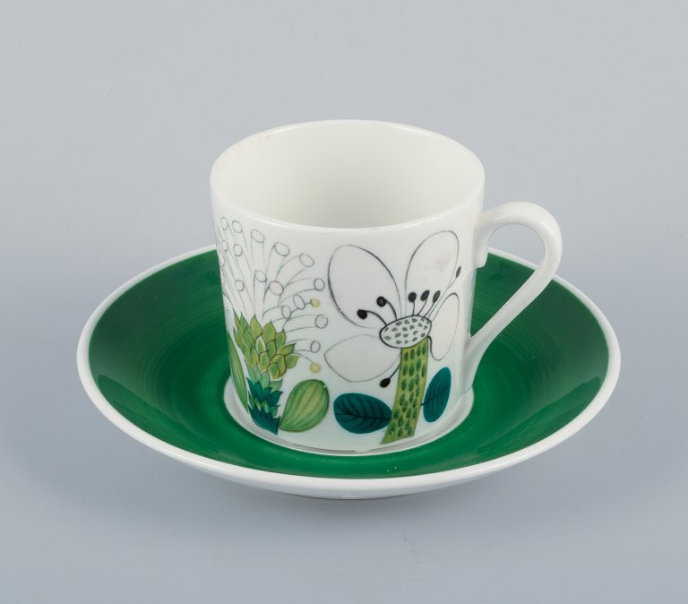 Stig Lindberg for Gustavsberg, Sweden. Rare "Tahiti" coffee cup with  saucer. Hand-painted with floral motifs. Retro style.
