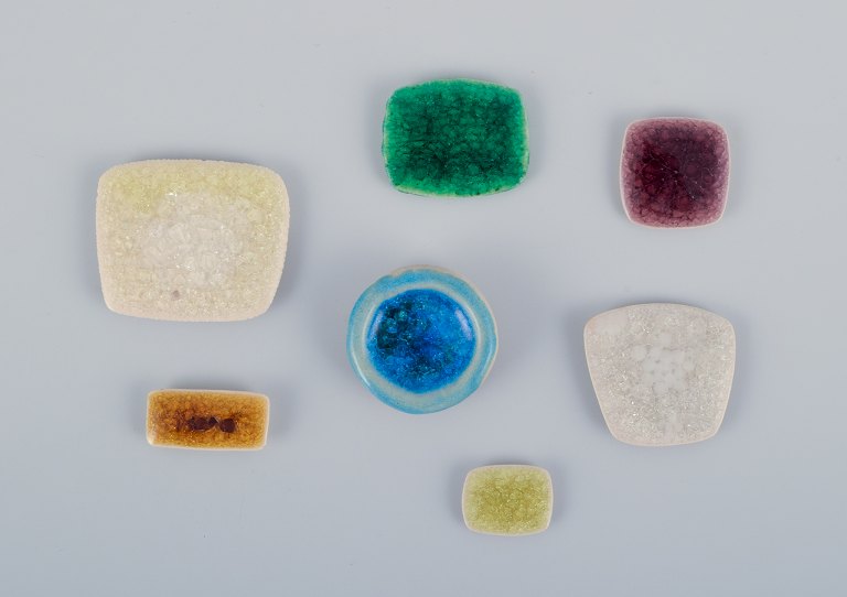 Ole Bjørn Krüger (1922-2007), Danish sculptor and ceramic artist. Seven unique brooches in glazed stoneware in different colors.