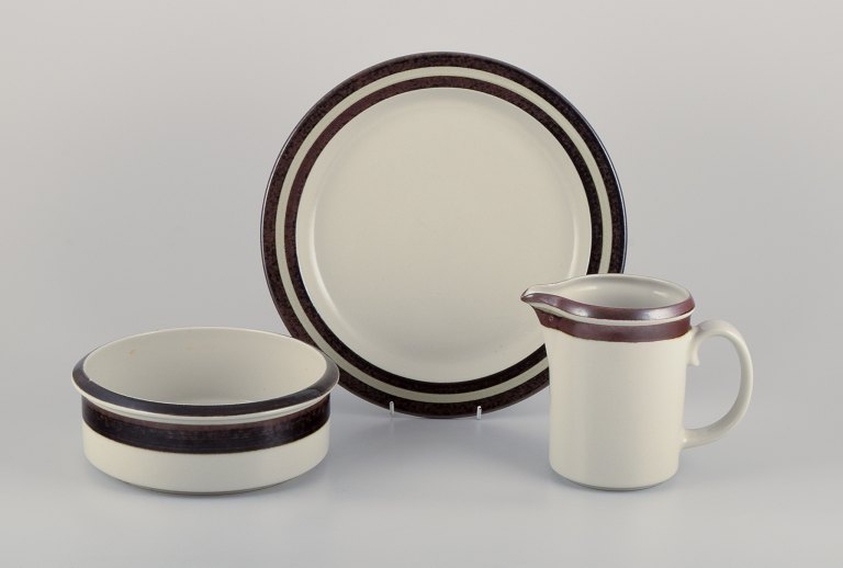 Arabia, Finland. Three pieces of "Karelia" stoneware. Pitcher, large round platter, and a big bowl.