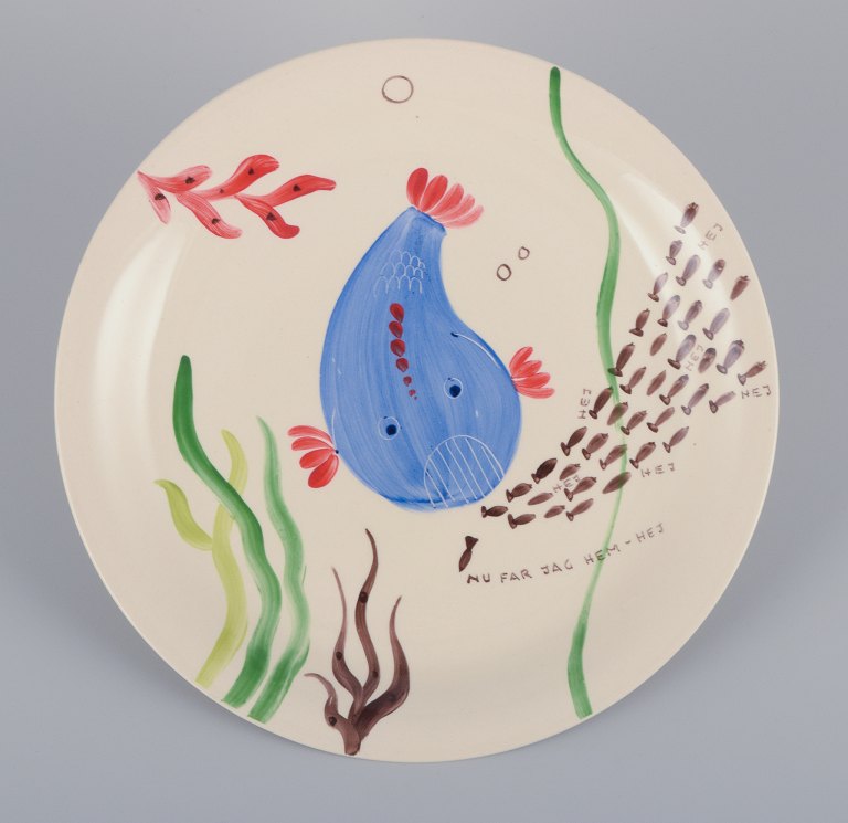 Stig Lindberg for Gustavsberg. "Löja" plate. Hand-painted with a fish motif. Satirical illustration with Swedish text.