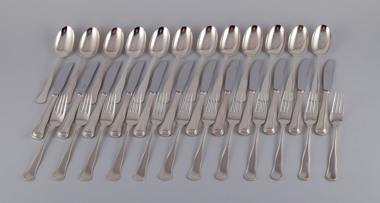 Cohr, Danish silversmith. "Old Danish". A complete twelve-person dinner set consisting of twelve dinner knives, twelve dinner forks, and twelve dinner spoons in 830 silver.