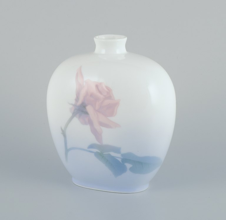 Royal Copenhagen, Art Nouveau porcelain vase decorated with a flower and dragonfly motif.