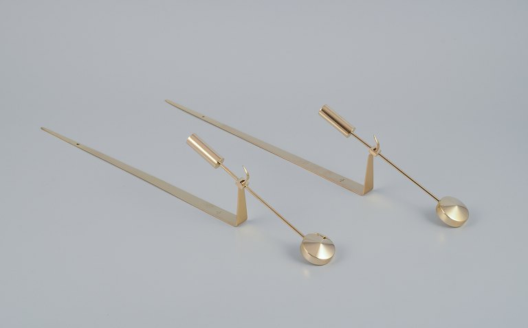 Skultuna, Sweden. A pair of wall-mounted candle holders in brass.Designed by Pierre Forsell in the 1970s.
