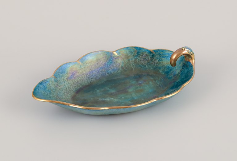 Josef Ekberg (1877-1945) for Gustavsberg, Sweden.Leaf-shaped ceramic bowl with glaze in green-blue tones, gold decoration.