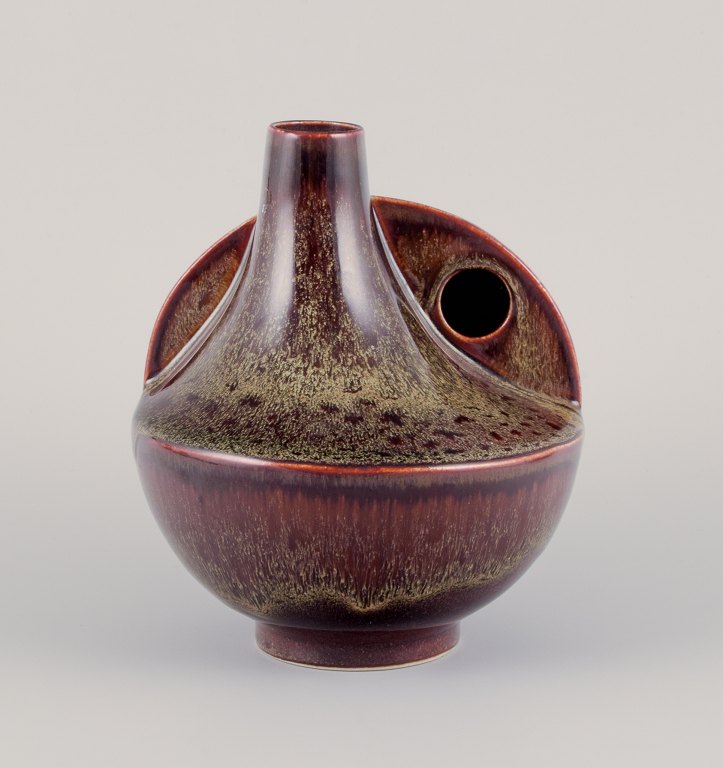 European studio ceramist. Unique ceramic vase with speckled glaze in brown tones.