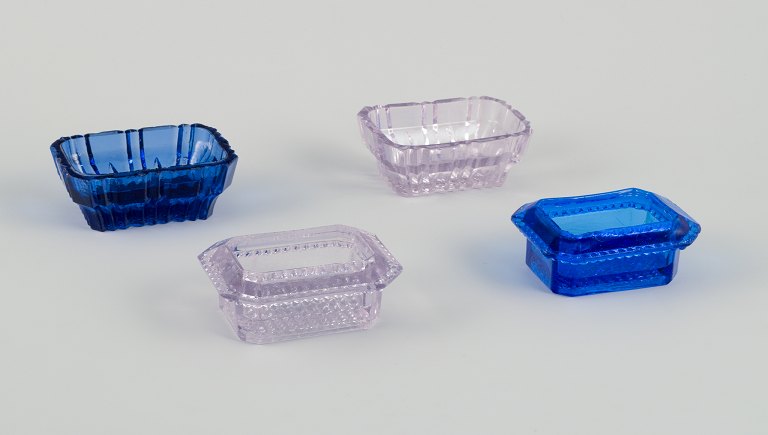 Fåglavik Glasbruk (1874-1980), Sweden.Four salt cellars in colored glass. Handmade blue and purple glass.