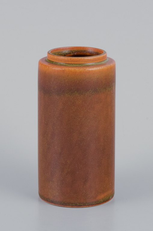 Bengt Berglund for Gustavsberg. Ceramic vase from the "Stampe" series. Ochre yellow glaze.