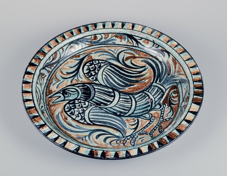 Sten Lindgren, Swedish ceramist for Porches Algarve, Portugal. Colossal unique ceramic bowl with a bird motif. Polychrome glaze.