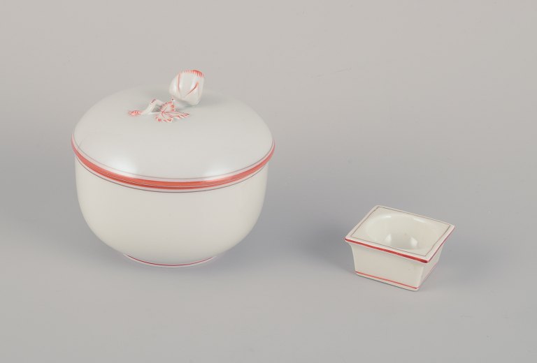 Meissen, Germany. A sugar bowl and a salt cellar. Decorated with coral red and gold-colored trim. Art Deco.