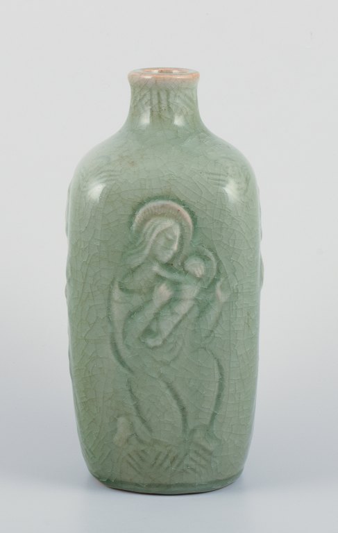 Jais Nielsen for Royal Copenhagen. Ceramic vase in celadon glaze with religious motifs.
