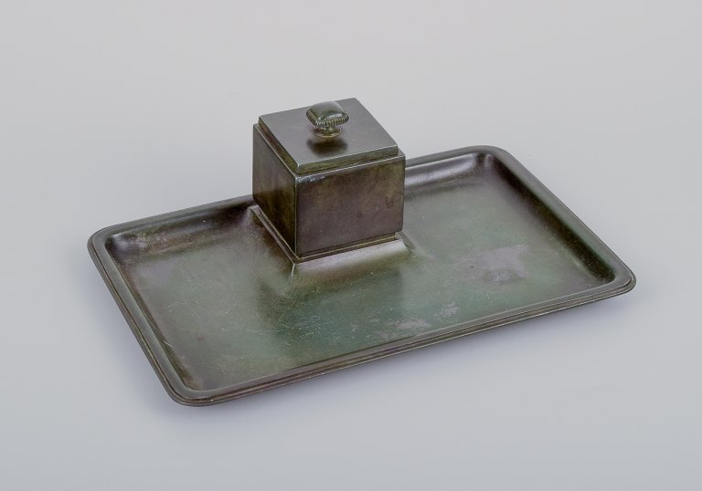 Just Andersen, early Art Deco inkwell in bronze. Rare model.Including original glass insert with lid.
