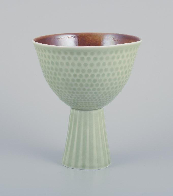 Carl Harry Stålhane for Rörstrand, Sweden. Rare ceramic vase. Mint-green glaze. Designed with dots and stripes.