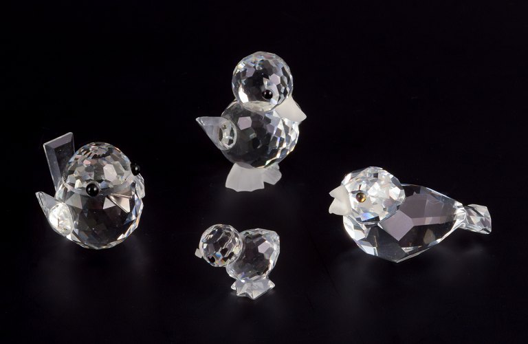 Swarovski, Austria.Four miniature bird figurines in faceted cut crystal glass.