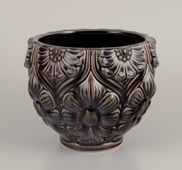 European studio ceramist.Large ceramic flower pot holder.