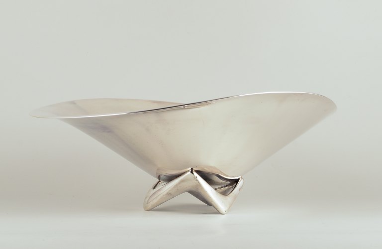 Henning Koppel for Georg Jensen, colossal bowl in sterling silver on a three-legged base.