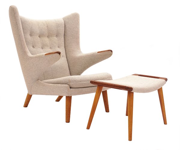 Hans J. Wegner “Papa Bear”. Wingback teak and oak easy chair with matching stool. AP 19 and AP 29