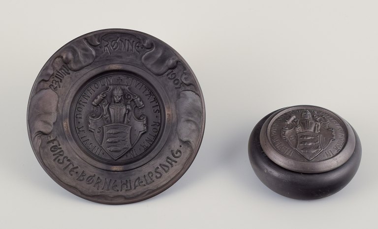 Hjorth, Bornholm.Wall relief and lidded jar in black terracotta.