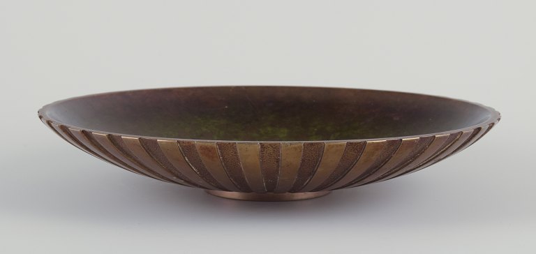 Tinos, Denmark
Large bowl in solid bronze.