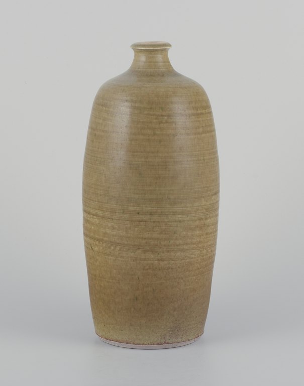 Danish studio ceramicist.Ceramic vase with aubergine glaze.