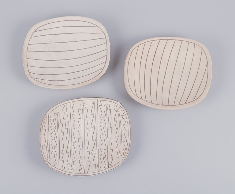 Gunnar Nylund for Nymølle, Denmark.Three unique bowls in terracotta.